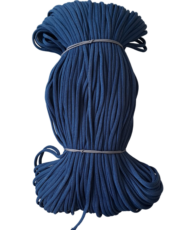 Coiled blue rope on a white background