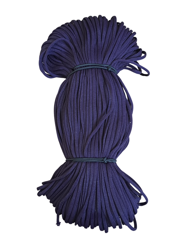 Coiled blue rope on a white background