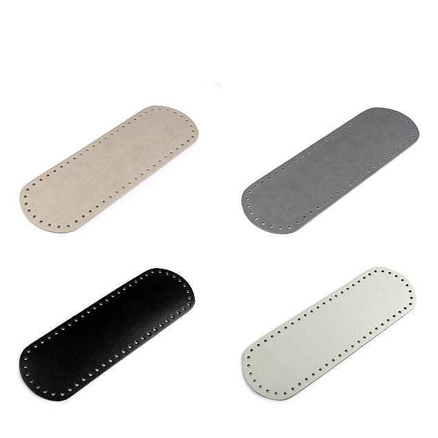 Set of six oval-shaped leather pads in different colors on a white background