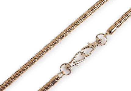 Gold chain necklace on a white background